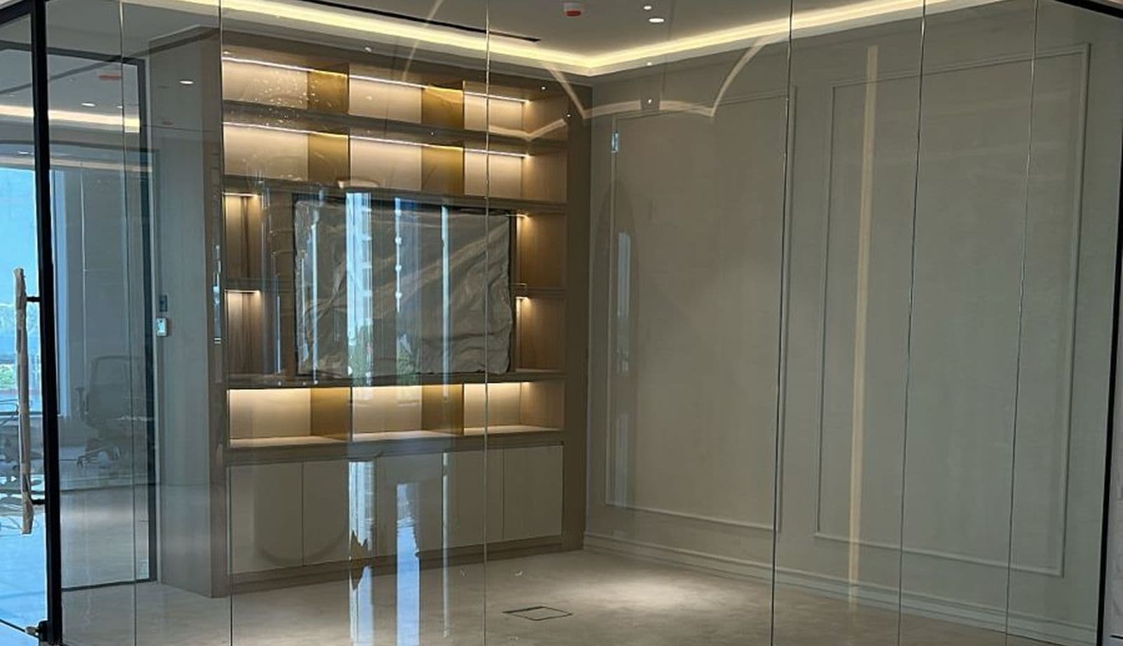 Curved frameless glass office partition project delivered by Pillarstone