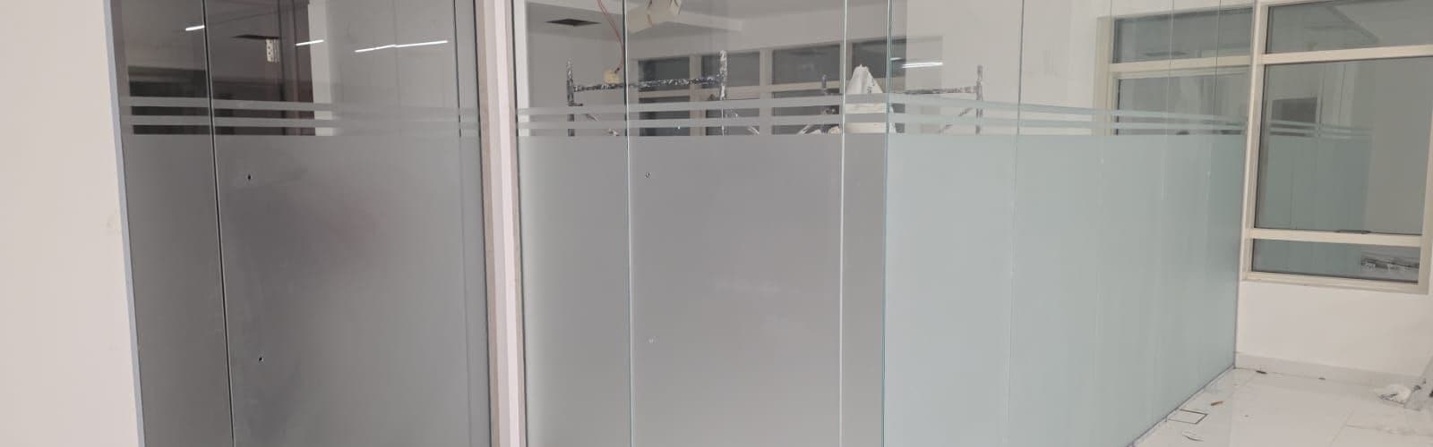 Glazed aluminium shopfront and entrance installed by Pillarstone in the UAE